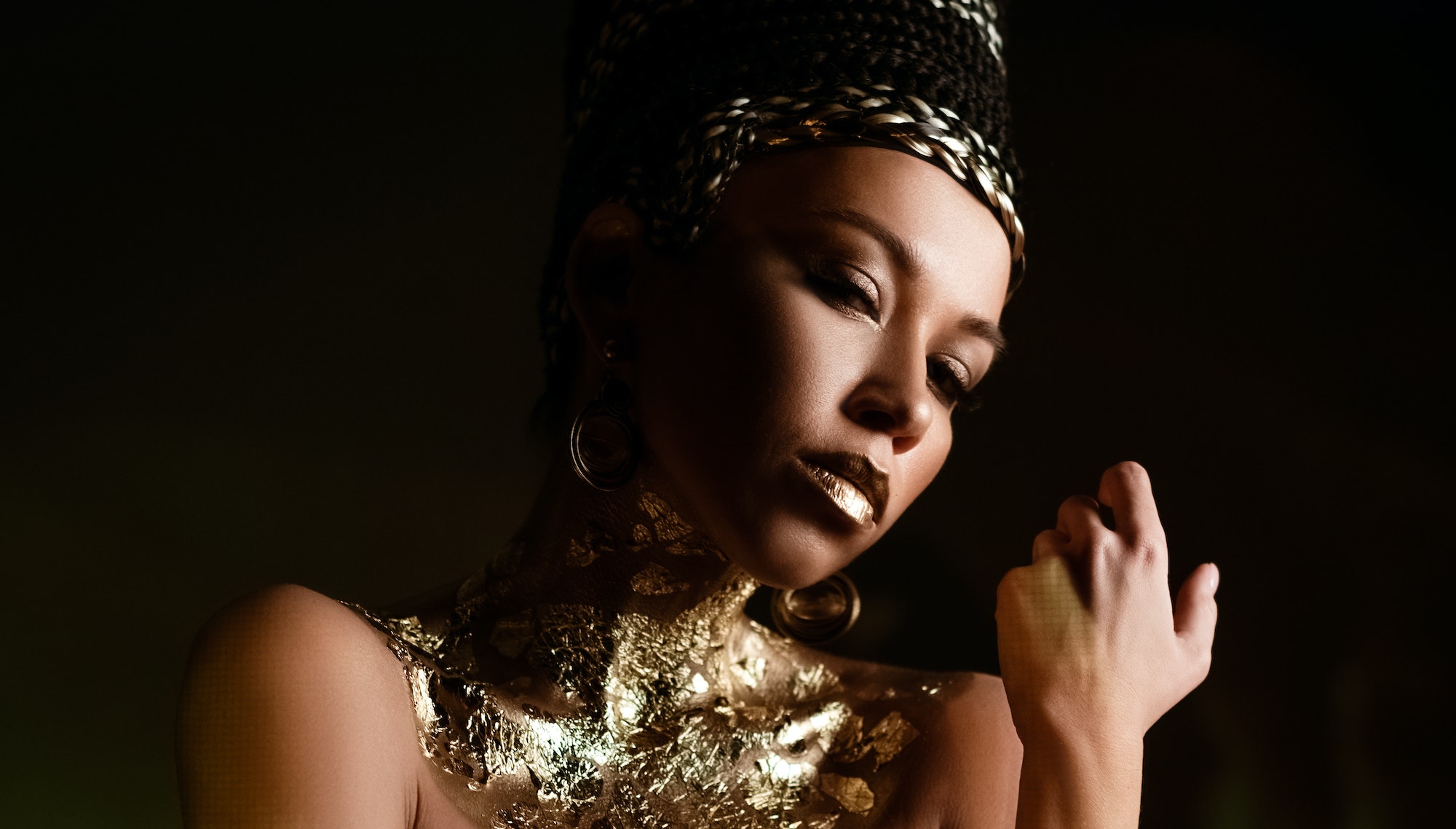 woman queen Cleopatra art photo, creative makeup Black hair